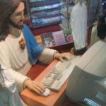 Jesus in front of Computer