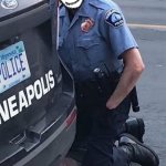 Cobson kneeling on George Floyd's neck