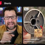 Mike Winger pointing to gun barrel