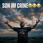 man screaming to sky with raised hands