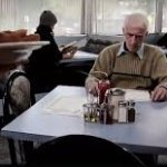 Old Man Alone At Restaurant