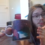 guy holding a mug with a foot meme