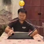 Artist chained to desk