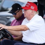 Trump in golf cart