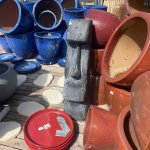 Moai surrounded by pots