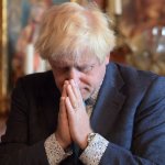 Boris Johnson praying