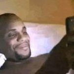 Guy laying in bed