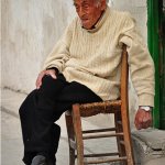 Old man sitting down