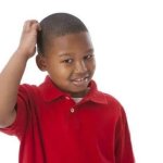 Kid with Hand On Head