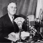 FDR at desk with microphones