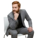 Randall Daniels sitting on Chair and thinking