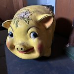 Cursed yellow piggy bank meme