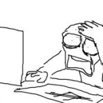 Guy looking at computer with horror