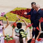 Trump with Xi and Xi gesturing to kids