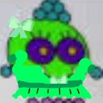 Geemer wearing a green dress