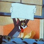 Tom holding a blank board
