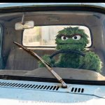 Oscar the grouch driving