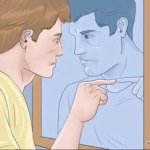 Guy pointing at a mirror