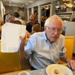 Bernie Sanders Holding Paper Diner