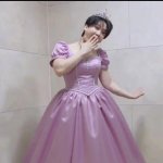 Me posing in a dress my mom made me wear
