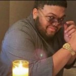 Druski smirk with sunglasses and candle meme