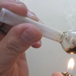Glass Crack Pipe Being Heated