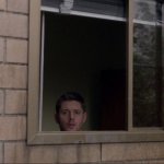 Dean Winchester looking out of the window