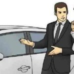 car salesman slaps roof of car