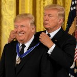 Trump, obsessed by medals, gives himself one for no reason.