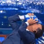 Steven Colbert Putting Oreos On His Mouth meme