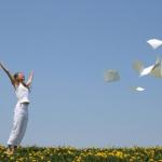 woman throwing papers