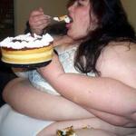 Fat woman with cake