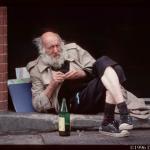 homeless man drinking