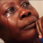 black woman crying