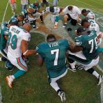 Praying Miami Dolphins