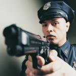 Police man with a gun
