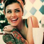 Tattooed Women | THESAURUS? IT'S AN INDOOR HOUSEPLANT, ISN'T IT? | image tagged in tattooed women | made w/ Imgflip meme maker