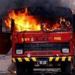 Irony ironic fire truck engine tender on fire