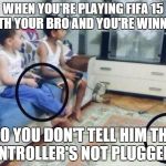 Yolo | WHEN YOU'RE PLAYING FIFA 15 WITH YOUR BRO AND YOU'RE WINNING SO YOU DON'T TELL HIM THE CONTROLLER'S NOT PLUGGED IN | image tagged in yolo | made w/ Imgflip meme maker