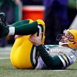 Aaron Rodgers on his back