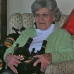 Old lady with booze bottles 