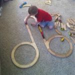 Wait until you see what his brother came up with... | ONE TRACK MIND | image tagged in trainset kid,kids | made w/ Imgflip meme maker
