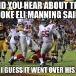 Eli Manning | DID YOU HEAR ABOUT THE JOKE ELI MANNING SAID WELL I GUESS IT WENT OVER HIS HEAD | image tagged in eli manning | made w/ Imgflip meme maker
