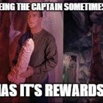 captain kirk | BEING THE CAPTAIN SOMETIMES.. HAS IT'S REWARDS.. | image tagged in captain kirk | made w/ Imgflip meme maker