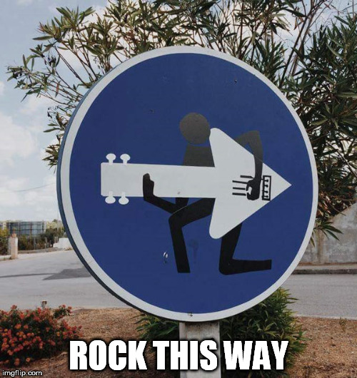 Rock on! | ROCK THIS WAY | image tagged in rock,funny signs | made w/ Imgflip meme maker
