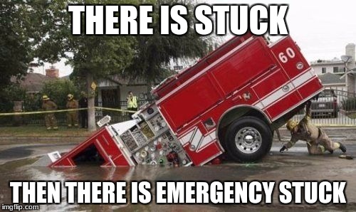 THERE IS STUCK; THEN THERE IS EMERGENCY STUCK | image tagged in firefighter | made w/ Imgflip meme maker