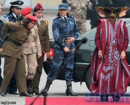 Gaddafi Female Bodyguards (Gremlin Variant 2) | image tagged in gaddafi,bodyguards,gremlin | made w/ Imgflip meme maker