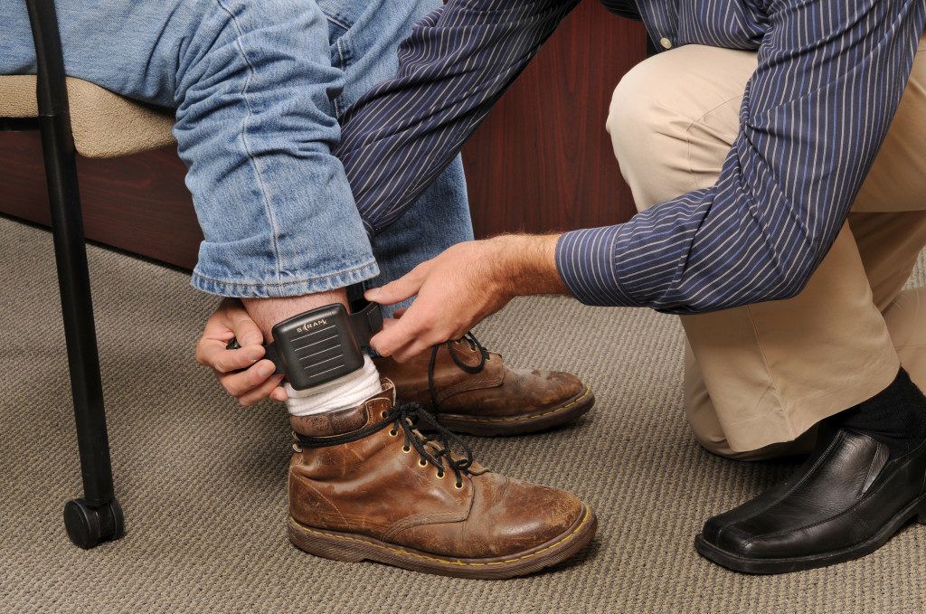 man with gps ankle monitor Blank Meme Template