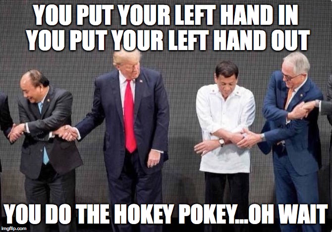 YOU PUT YOUR LEFT HAND IN YOU PUT YOUR LEFT HAND OUT; YOU DO THE HOKEY POKEY...OH WAIT | image tagged in hokeypokey | made w/ Imgflip meme maker