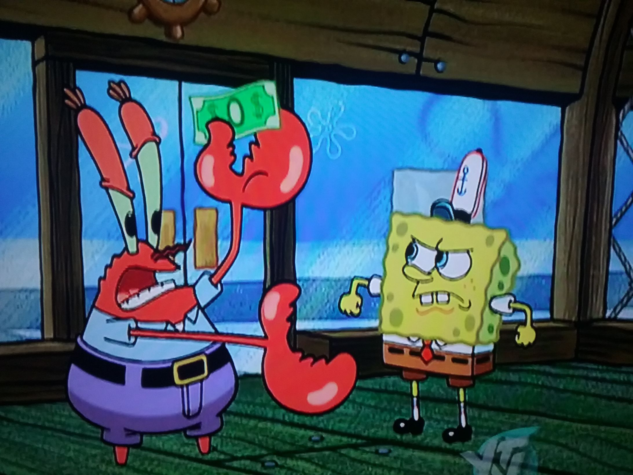 Mr.Krabs fighting with Spongebob. 
